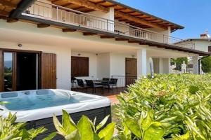 NEU Suite Perlago, Whirlpool & Seeblick Apartments, Tignale