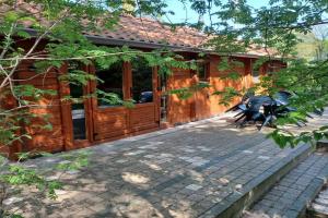 Knus houten huisje op groot en groen perceel op de Veluwe Guest house, Epe
