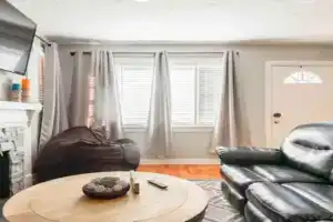 Charming Farmhouse Retreat near Downtown & University Modern Amenities, Fireplace & Porch!, Birmingham