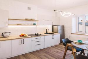 Apartamenti v staromu misti z kraievidom na Kanyon ta park, Kamenets-Podolskiy