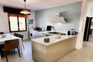 Under the Lemon Tree Apartments, Caletta