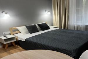 Stilnaya studiya Shadow Atakent Apartments, Almaty