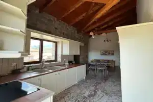 To Petrino Condo Apartments, Stoupa