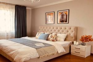 Uyutnaya v tsentre s potryasayushchimi vidami Apartments, Almaty