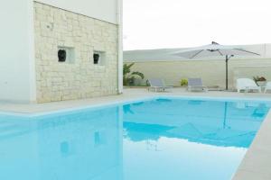 Vela Bianca Apartments, Reitani