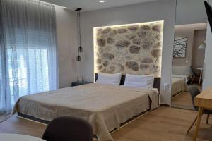 Eclectic Studio with Stone, Volos