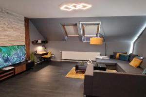 Men's World Apartments, Gyula