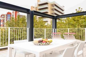Relax in the terrace of our flat - Beahost Apartments, Lignano Sabbiadoro