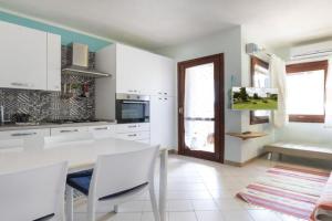 Casa Vacanze L'Aquilone - casa sulla spiaggia - baia di Porto Rafael, Palau
