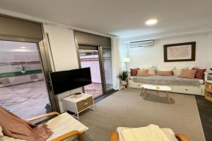 Private terrace 1BR apt - 4min walk to the beach Apartments, Calella