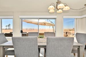 Oceanfront Home on the Boardwalk with 3 car Garage, AC, Giant Patio, Ocean Views, Walk to Pier Guest house, Newport Beach