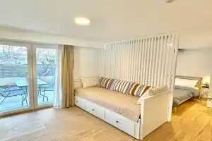 Minimalist Seaside Apartment with Private Patio and Parking - Blue Zone Homes, Olympiaki Akti