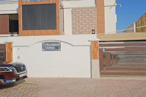 Anushthan Villa a private serviced villa for events and staycation with luxury views of garden and fountain pool in UAE, Ajman City