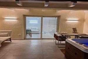 Luxury House & Spa in Baia Turchese con idromassaggio privato, Murta Maria