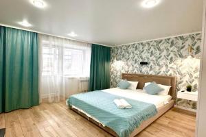 s proektorom po Auelbekova 120 Apartments, Kokshetau