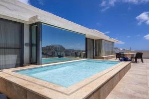 Mellieha Penthouse with pool and view by Homely, Mellieha