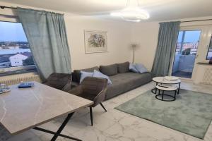 DEICHLIEBE 1 - traumhafter Ausblick, eigene Garage & kontaktloser Check-in - KOMFORT PUR!!! Apartments, Bremerhaven