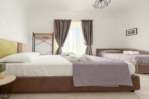 FeVi Rooms, Noto