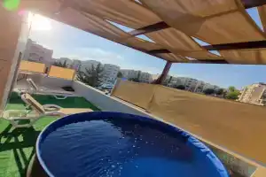 Rooftop pool with terraces F-R Apartments, Amman