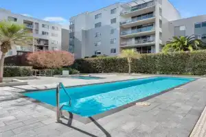 Modern 1-Bed Unit with Pool Views and Balcony Apartments, Canberra