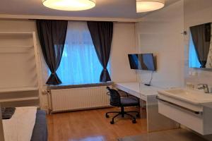 Flataid Gästehaus Graschi - gutes und günstiges Einzelzimmer - Steinbergstraße Apartments, Graz