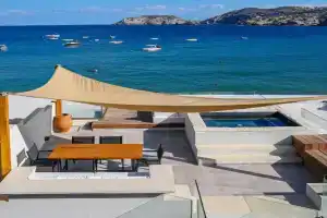 Theasis Beachfront Villa with Terrace seconds from the Beach by Hospi, Agia Pelagia