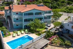 Apartments and rooms with a swimming pool - 23592, Senj