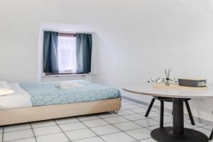 GuestHost - Stylish Studio in Turin's Vibrant Quadrilatero, Torino