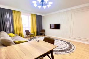 Uyutnaya vozle ploshchadi Apartments, Shymkent