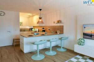 Haus am Dorfbrunnen Ferienwohnung Strandfloh Apartments, Wangerooge