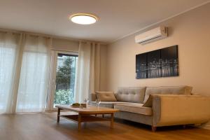Modern terraced apartment with green garden, Bydgoszcz