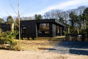 Knus gezinsverblijf in Cosi Tiny House op de Veluwe, Epe