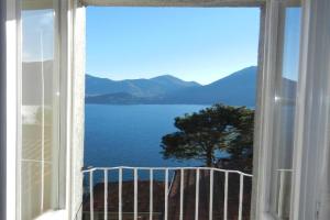 Charmantes Pfarrhaus mit Seeblick und Garten Apartments, Ghiffa