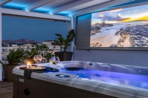 Central penthouse studio with Jacuzzi in Varkiza, Vari