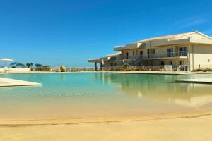 Olimpia Holiday con Piscina fronte mare Apartments, Marzamemi