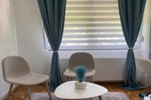 Alman apartman, Kraguyevats