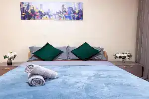 Domashnyaya obstanovka v tsentre goroda bayt Apartments, Almaty
