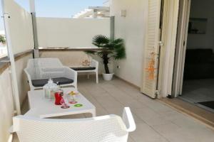Magellano House-Verso Sud, Torre San Giovanni