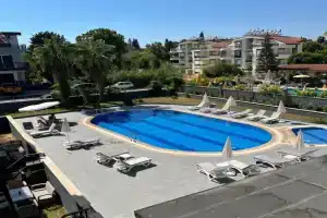 SideByLotus Apartments, Side