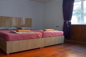 large bedroom with two separate beds, Zugdidi