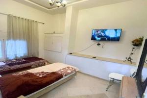 Studio meublé avec Wi-Fi, Rez-de-chaussée centre Ennasr, rue Hedi Nouira, Tunis