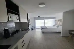 Departamento con piscina en el corazón de Parque O'higgins, Movistar Arena Apartments, Santiago
