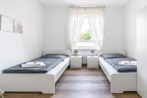 Voll ausgestattete und möblierte Apartments mit Einzelbetten - Küche - WLAN - PKW-Parkplatz, Offenbach
