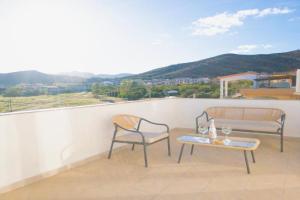 Rena & Agua Apartments, Caletta