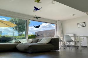 Modern & Cosy Holiday Cottage with Patio & Fenced Garden near Dunes & Beach, Koksijde