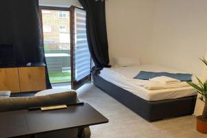 1 Zimmer Ferienapartment mit Parkmöglichkeit und Balkon, Neumunster