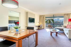 Tropical King Suite with Private Pool & Balcony Escape Apartments, Darwin