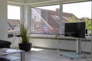 Inselblume 58 - Ferienwohnung mit Balkon in Neue Tiefe Guest house, Burg auf Fehmarn