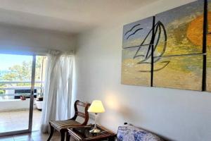Retro art and mirrors Molos Apartments, Limassol