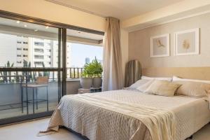 Essential Brooklyn - Stúdio com varanda e academia - By Easy Stay Apartments, Sao Paulo